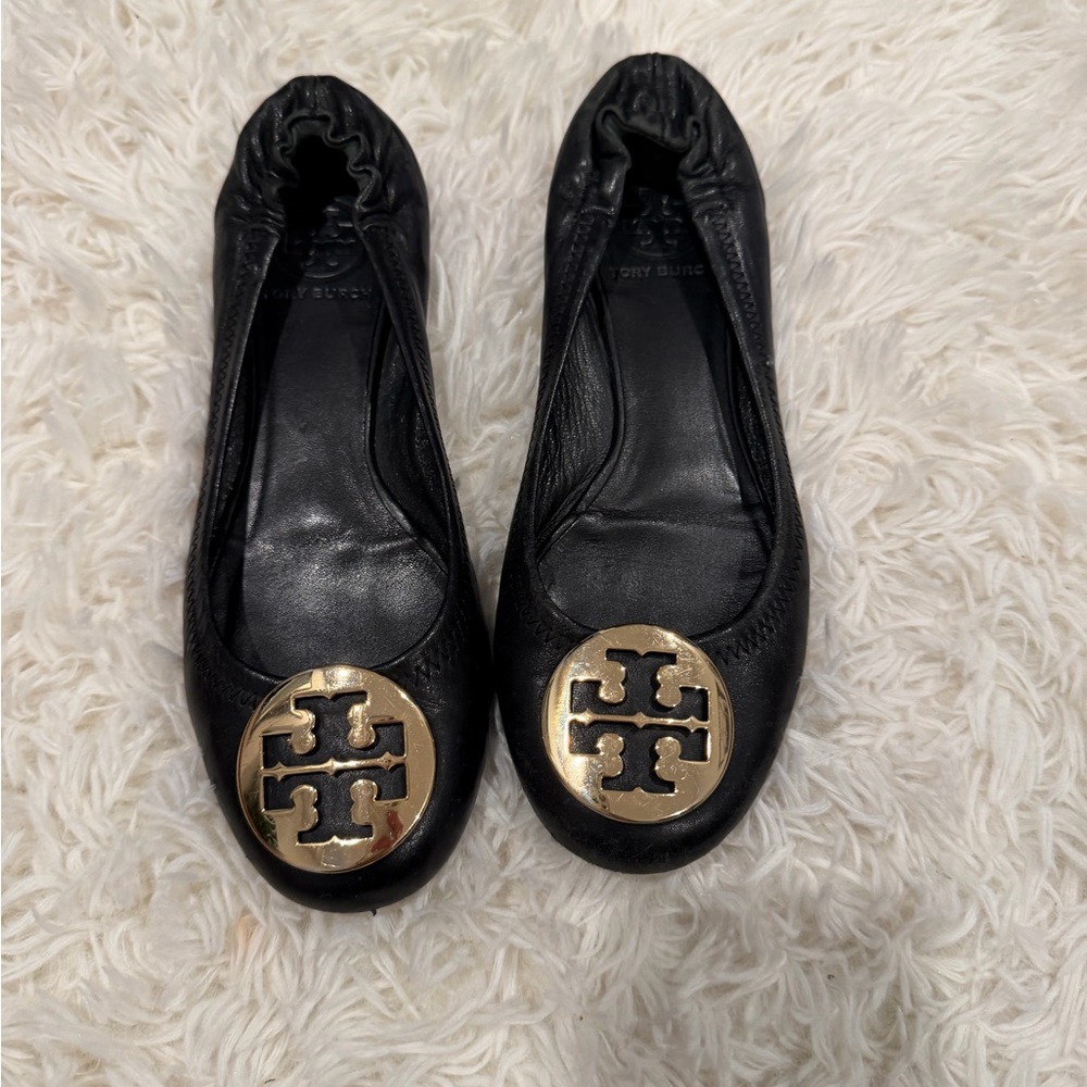 Tory Burch Black Flats with Gold Emblem